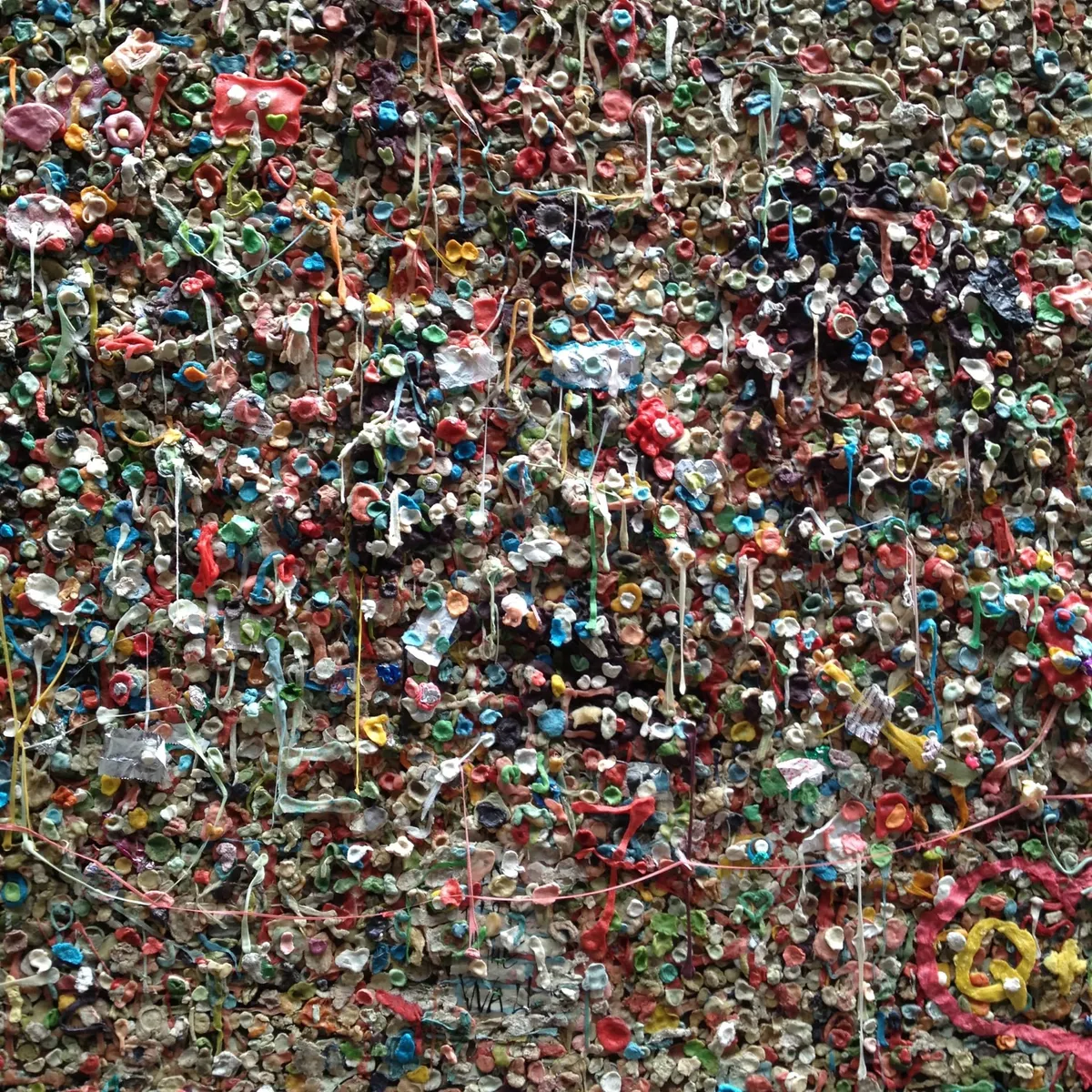 Wall covered in chewed gum