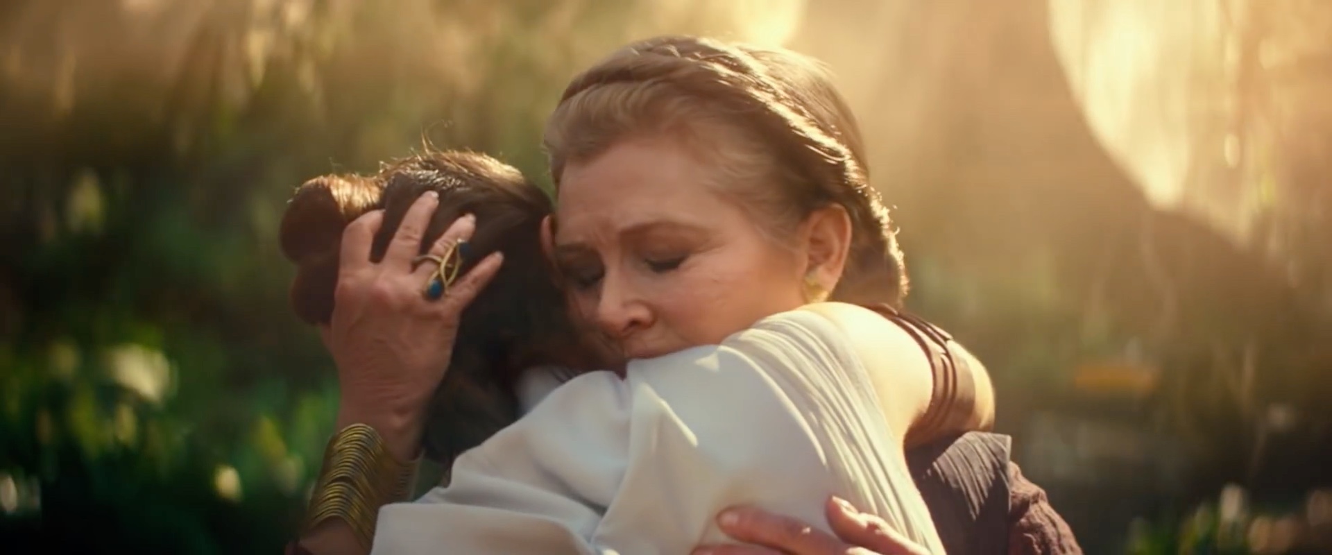 Leia embraces Rey
